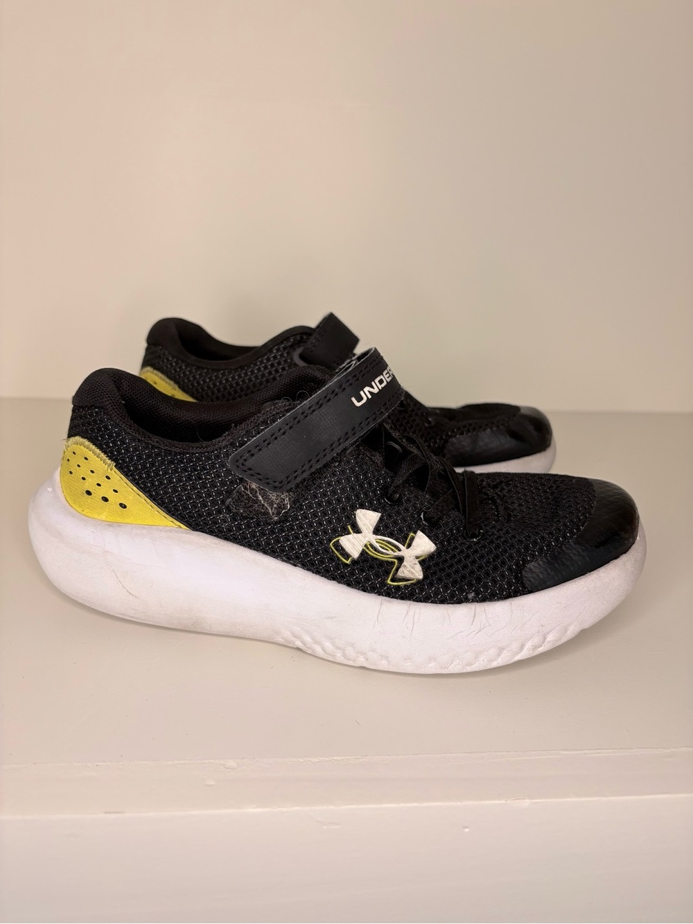 Under Armour Kids Black with Yellow Athletic Sneakers with White Sole